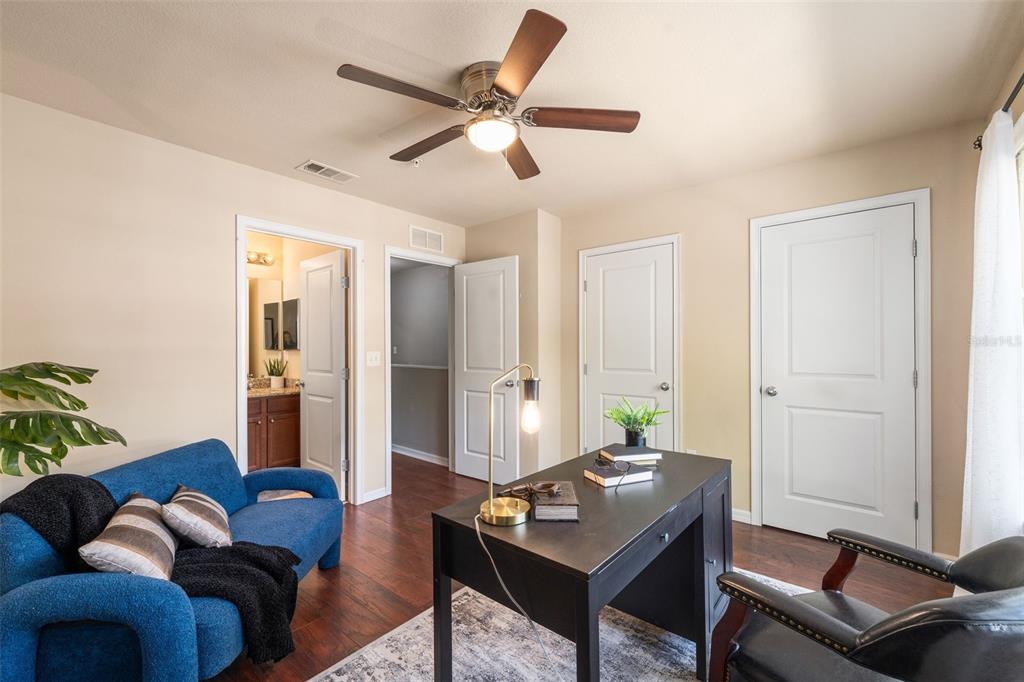 4639 Southwest 48th Drive, Unit 151 Gainesville, FL 32608 - Photo 12 of 26 a living room with furniture and a window