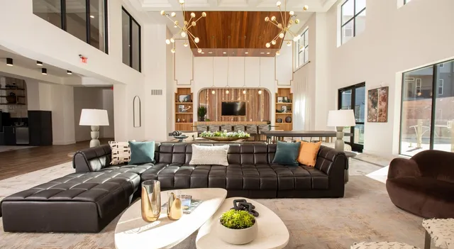 a outdoor living space with furniture and a chandelier