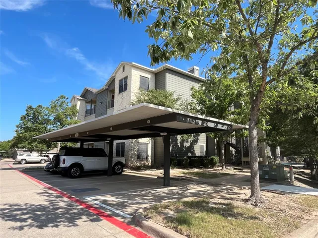 a car parked in front of a house