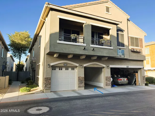 a view of a car park of the house