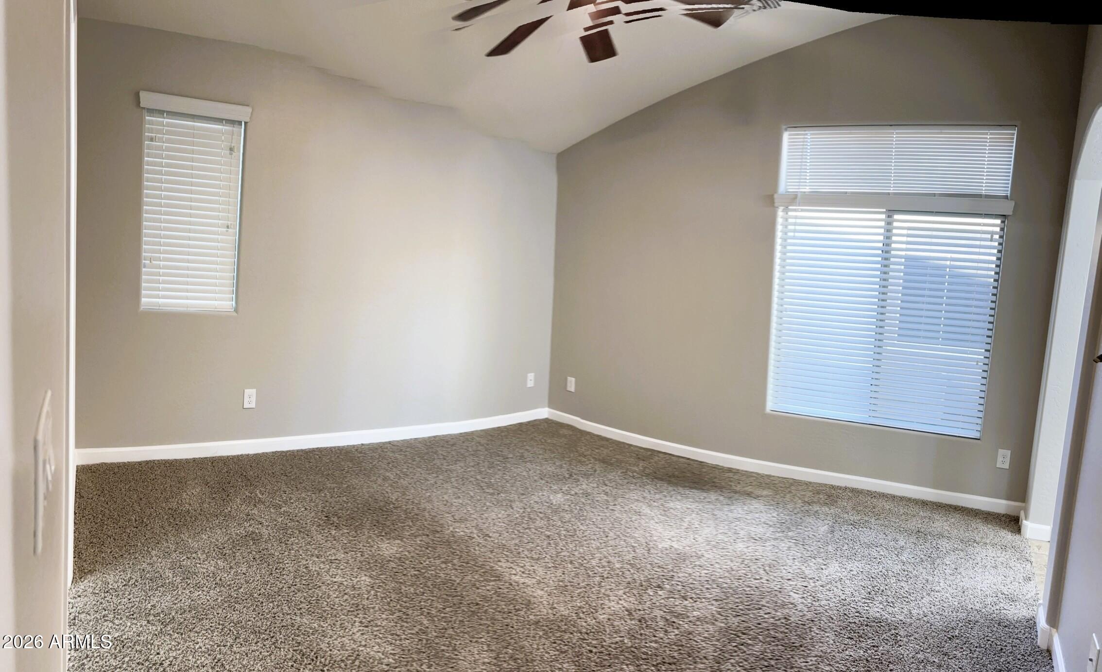 2150 West Alameda Road, Unit 1265 Phoenix, AZ 85085 - Photo 11 of 25 an empty room with windows