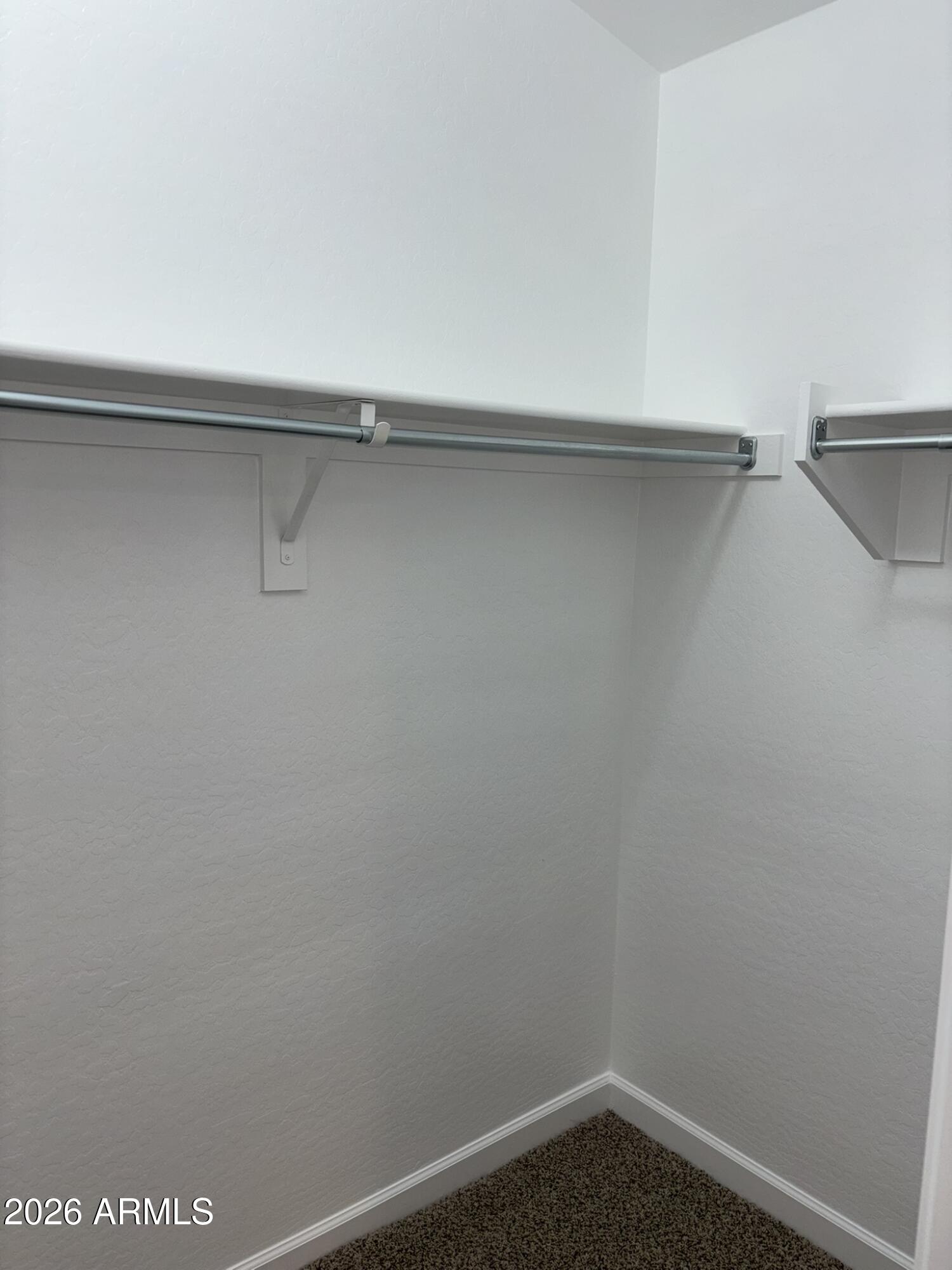 2150 West Alameda Road, Unit 1265 Phoenix, AZ 85085 - Photo 14 of 25 a view of small space with racks on the wall