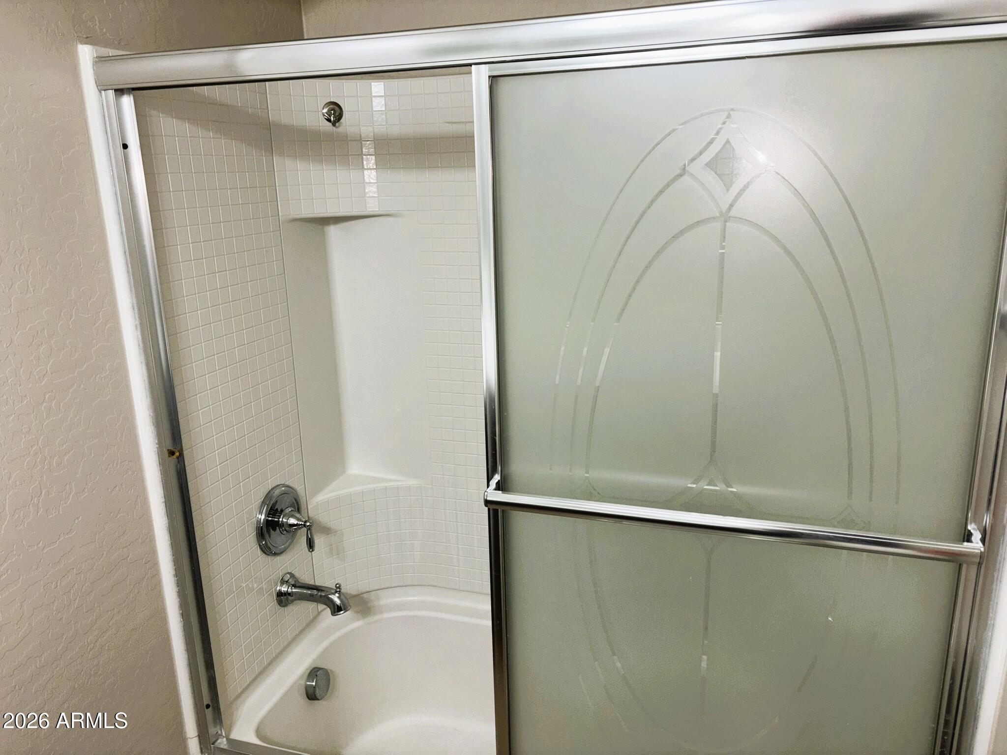 2150 West Alameda Road, Unit 1265 Phoenix, AZ 85085 - Photo 21 of 25 a bathroom with a shower and a sink