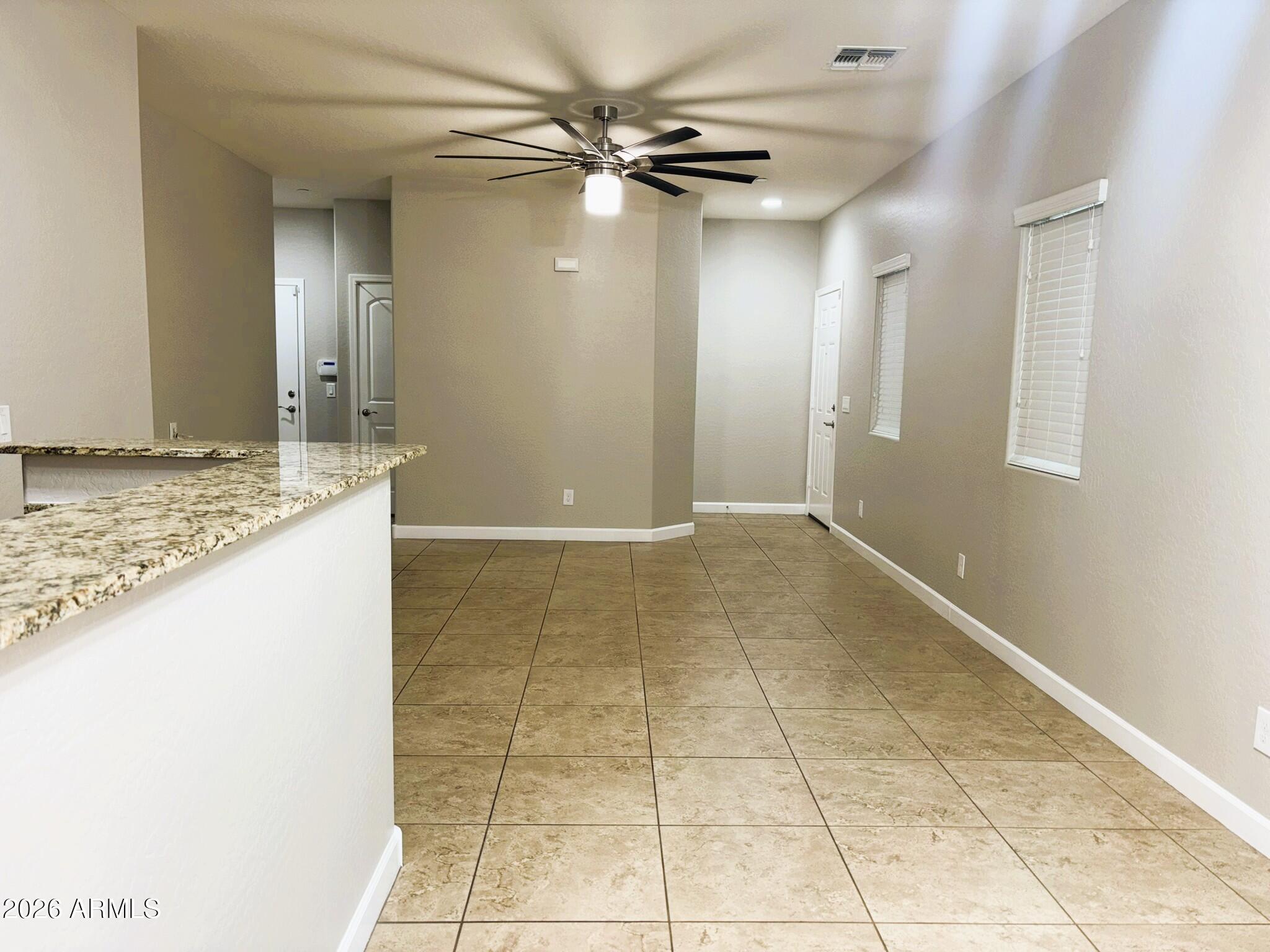 2150 West Alameda Road, Unit 1265 Phoenix, AZ 85085 - Photo 4 of 25 a view of an empty room