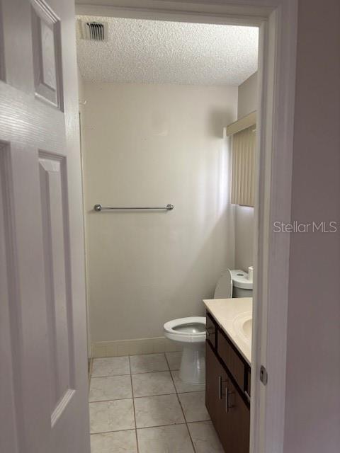 10405 Southwest 98th Terrace Ocala, FL 34481 - Photo 11 of 18 a bathroom with a sink a toilet and shower