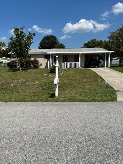 10405 Southwest 98th Terrace Ocala, FL 34481 - Photo 2 of 18 front view of house with a yard