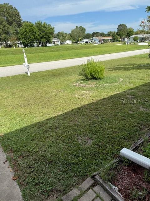 10405 Southwest 98th Terrace Ocala, FL 34481 - Photo 3 of 18 a view of a city with a large pool