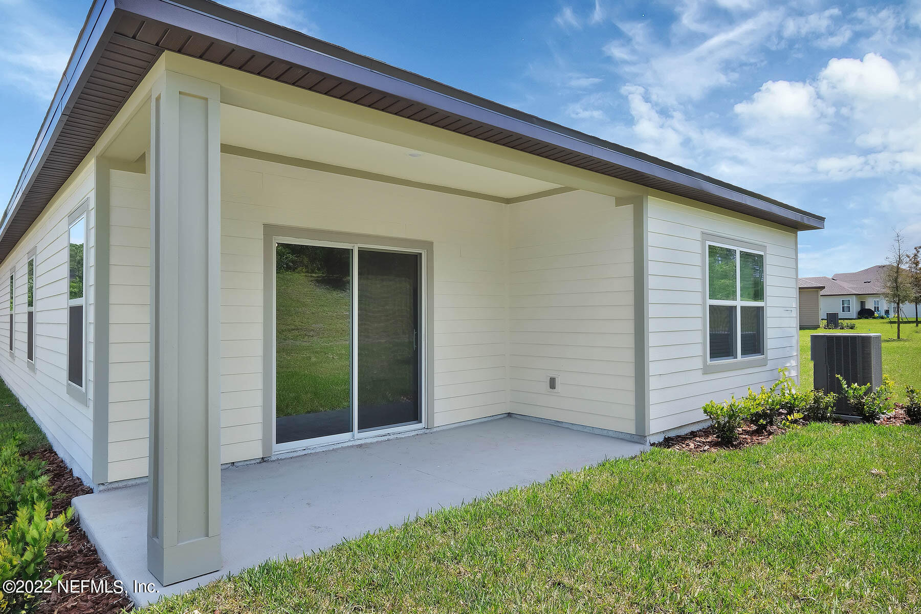 80 Falcon Ridge Road St. Augustine, FL 32084 - Photo 11 of 11 a view of an house with backyard and garden