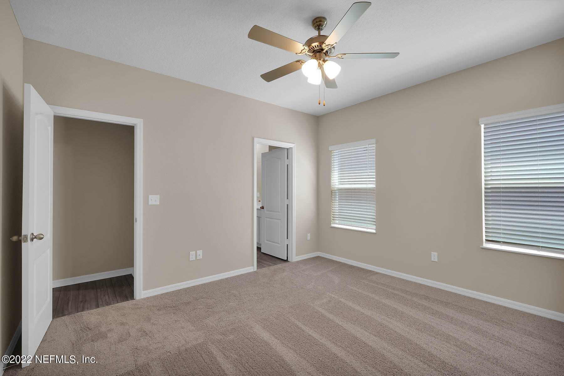 80 Falcon Ridge Road St. Augustine, FL 32084 - Photo 9 of 11 a view of an empty room with a window