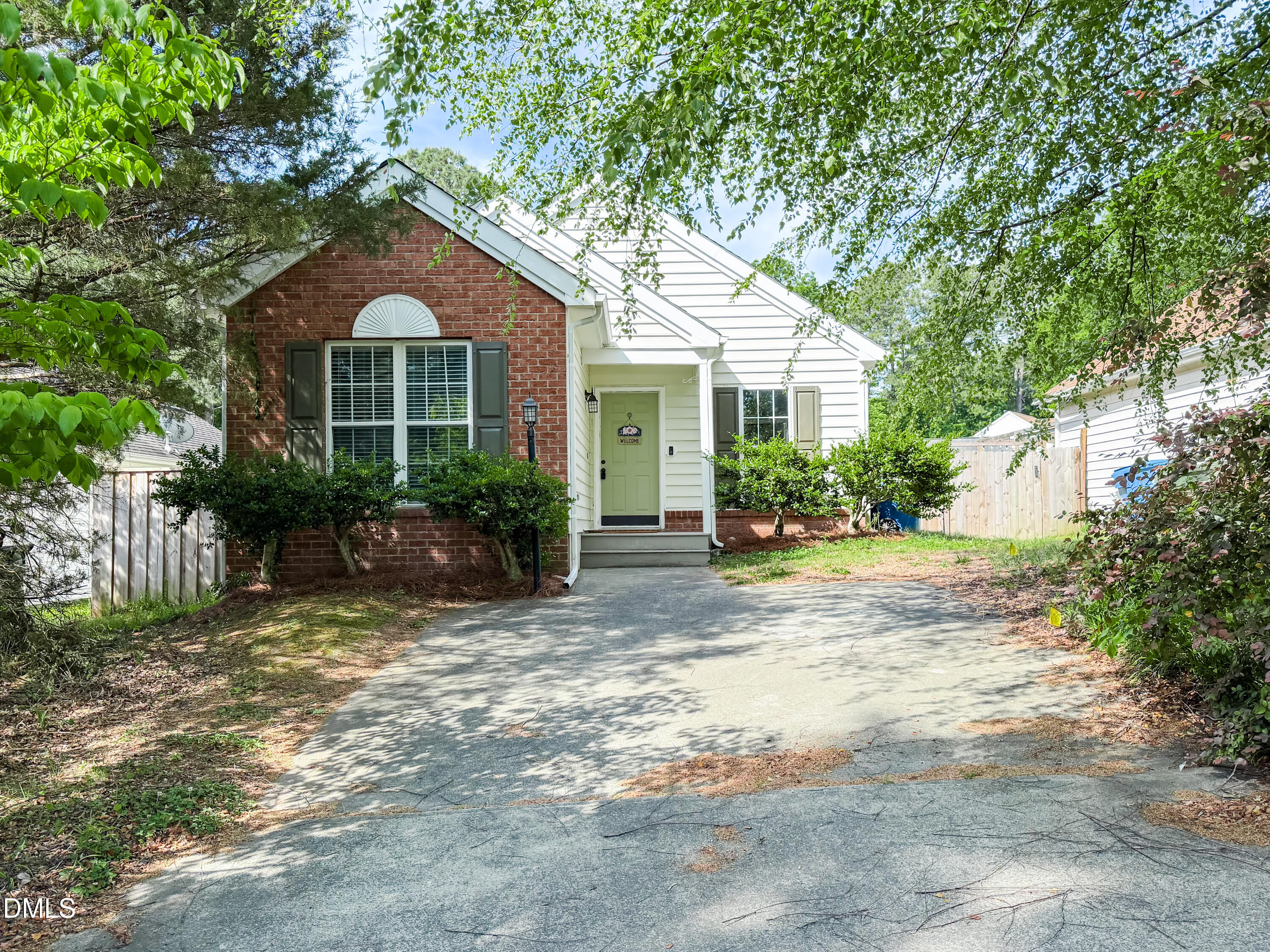 6304 Forest Ridge Drive Durham, NC 27713 - Photo 2 of 29 a front view of a house with garden