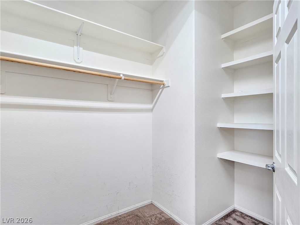 2485 Morrow Ridge Place Laughlin, NV 89029 - Photo 26 of 40 Ample shelving and hanging space in this well-appointed walk-in closet.