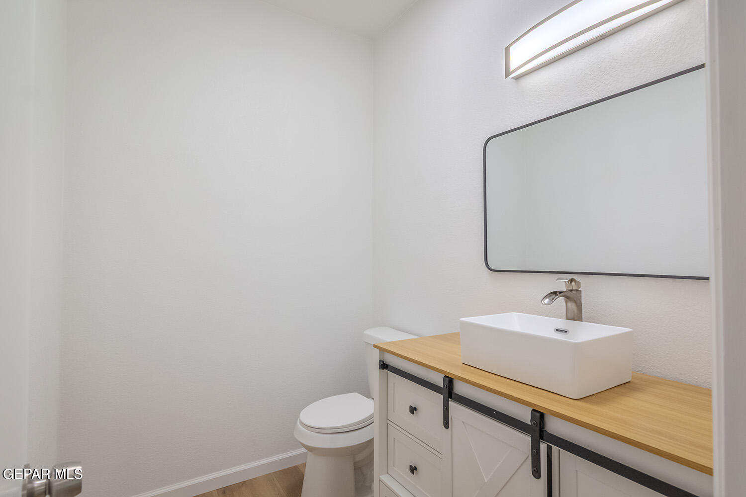 4 Cielo Del Este Anthony, NM 88021 - Photo 51 of 90 a bathroom with a sink and a mirror