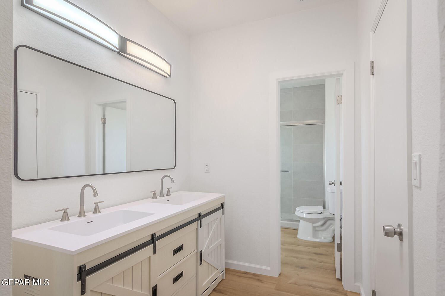 4 Cielo Del Este Anthony, NM 88021 - Photo 55 of 90 a bathroom with a sink and a mirror