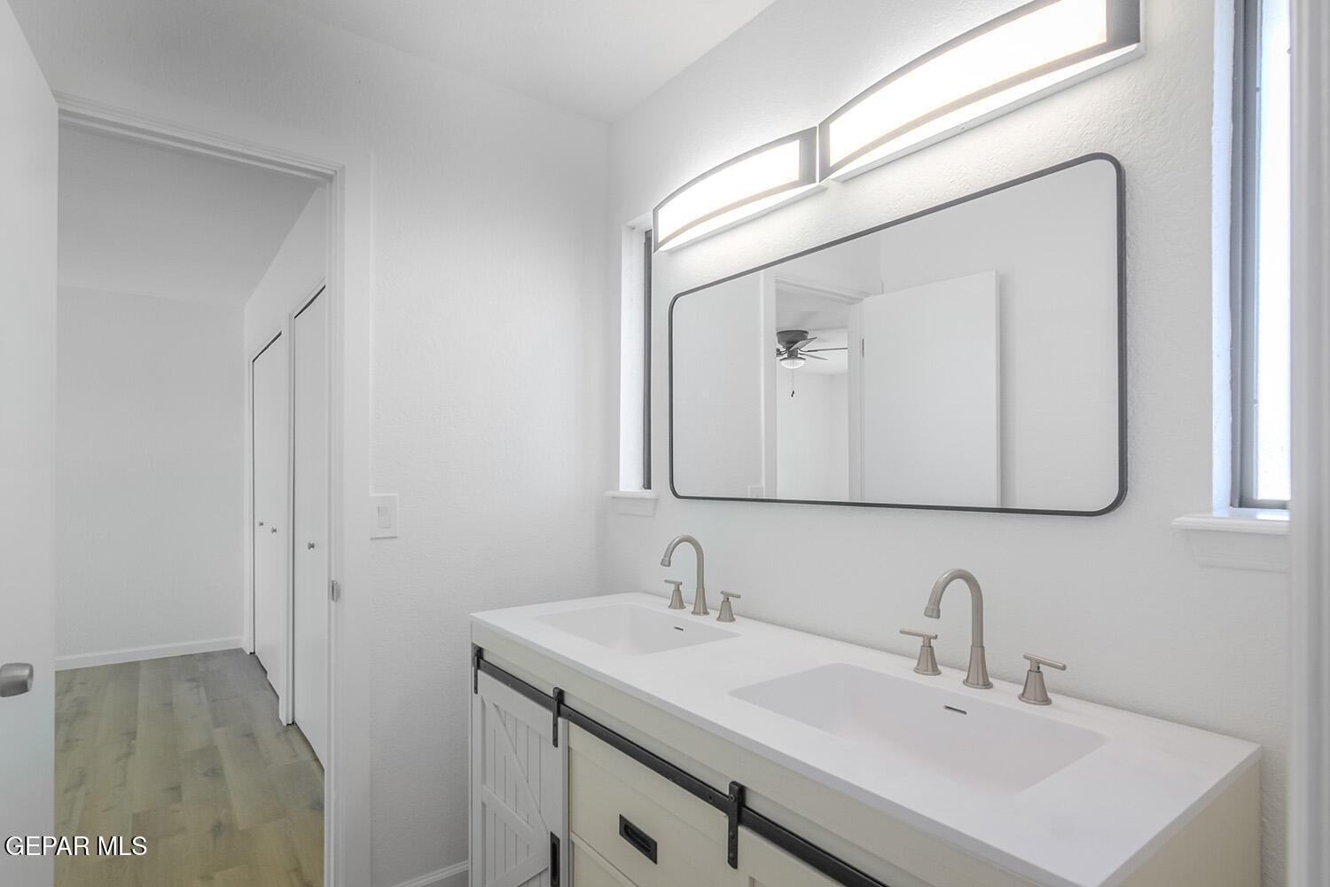 4 Cielo Del Este Anthony, NM 88021 - Photo 72 of 90 a bathroom with a sink and a mirror