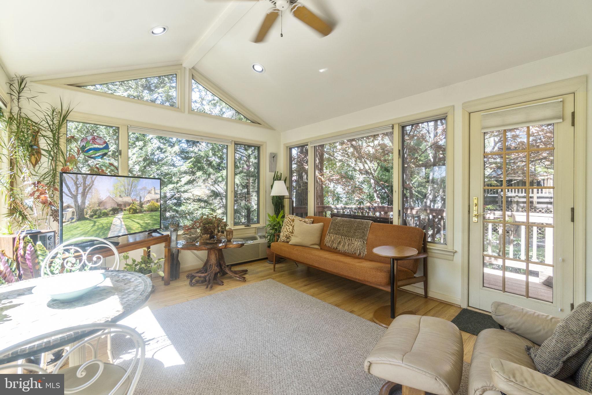 9506 Thornhill Road Silver Spring, MD 20901 - Photo 6 of 22 Main Level Sunroom with access to deck