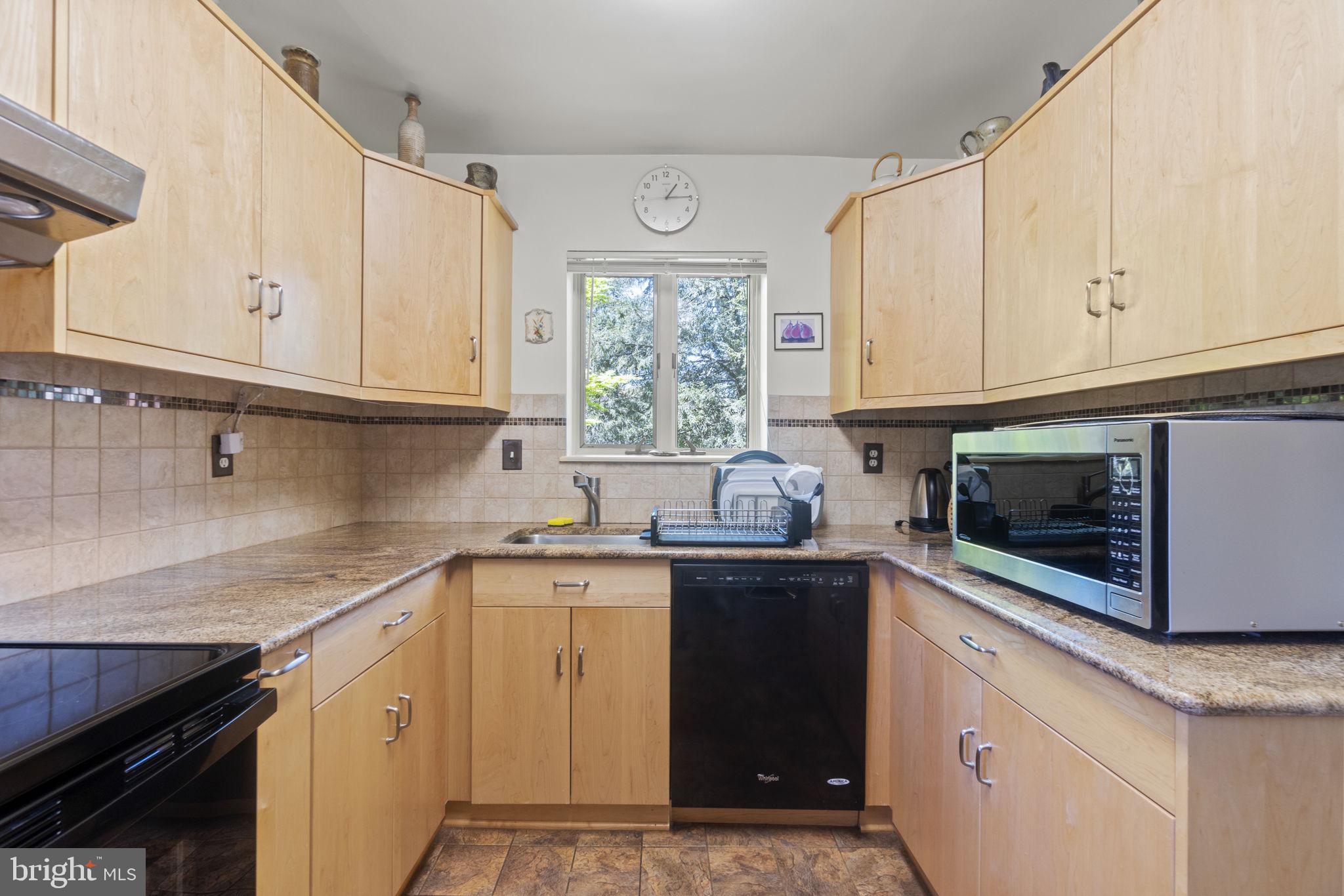 9506 Thornhill Road Silver Spring, MD 20901 - Photo 8 of 22 Kitchen with cabinets crafted by Amish craftmakers