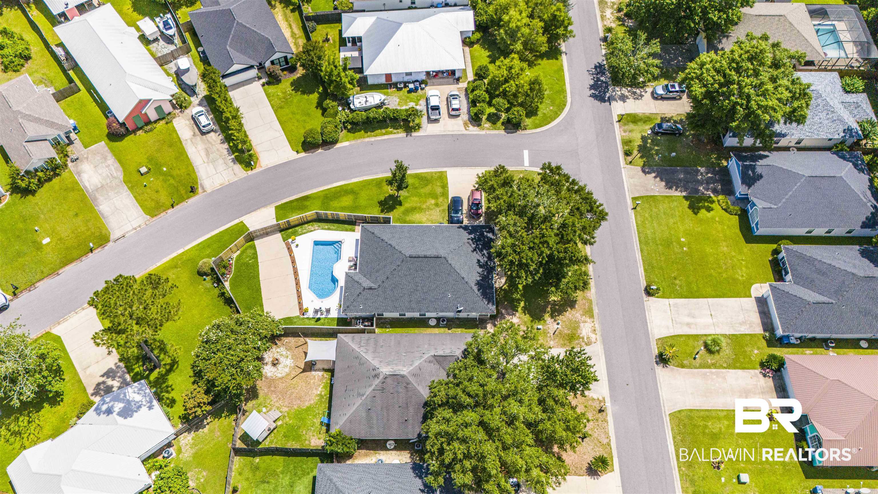 4620 Pine Boulevard Orange Beach, AL 36561 - Photo 43 of 49 Aerial perspective of suburban area with a pool