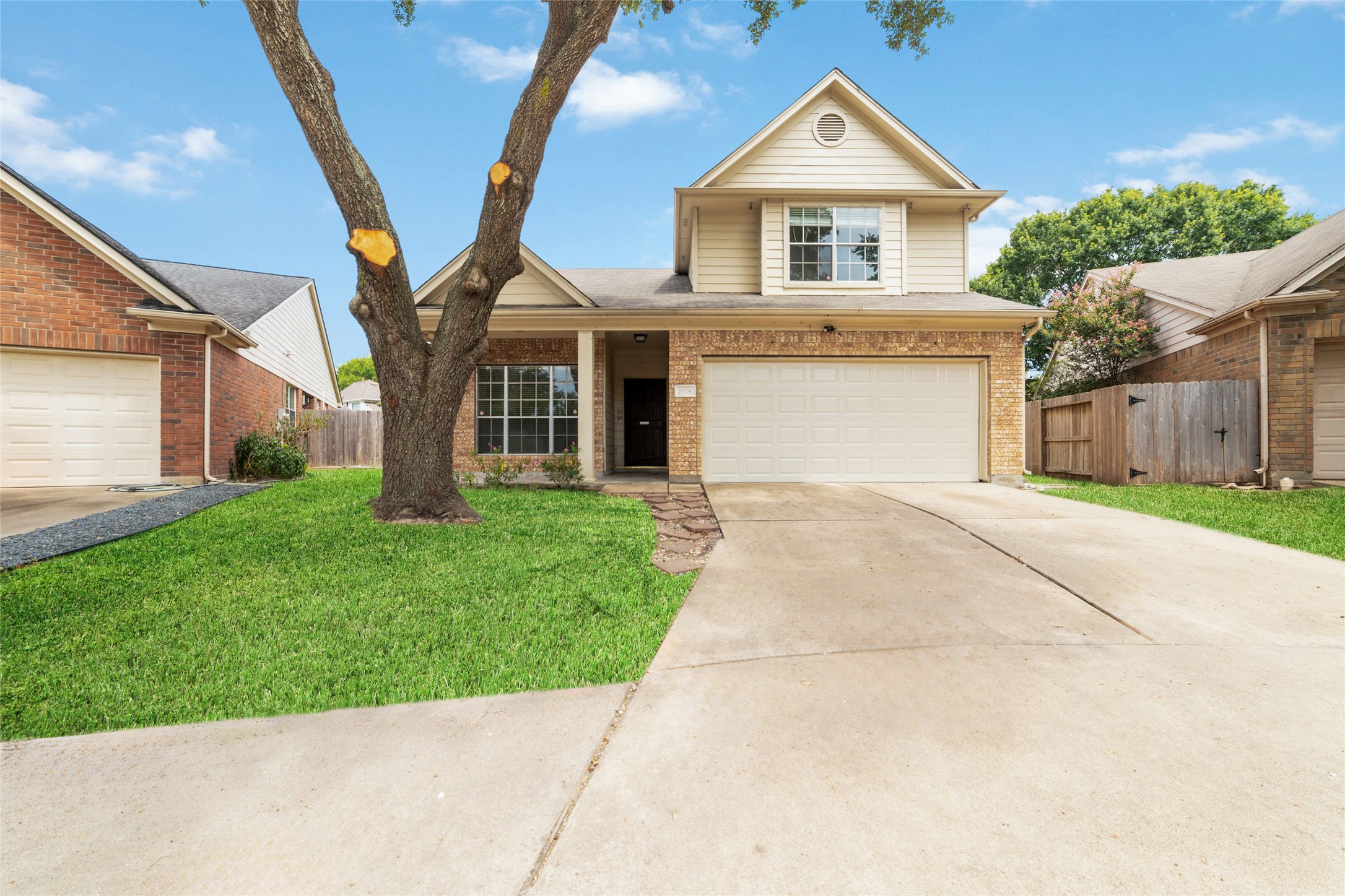 20026 Coyote Ridge Lane Katy, TX 77449 - Photo 1 of 22 a front view of house with yard