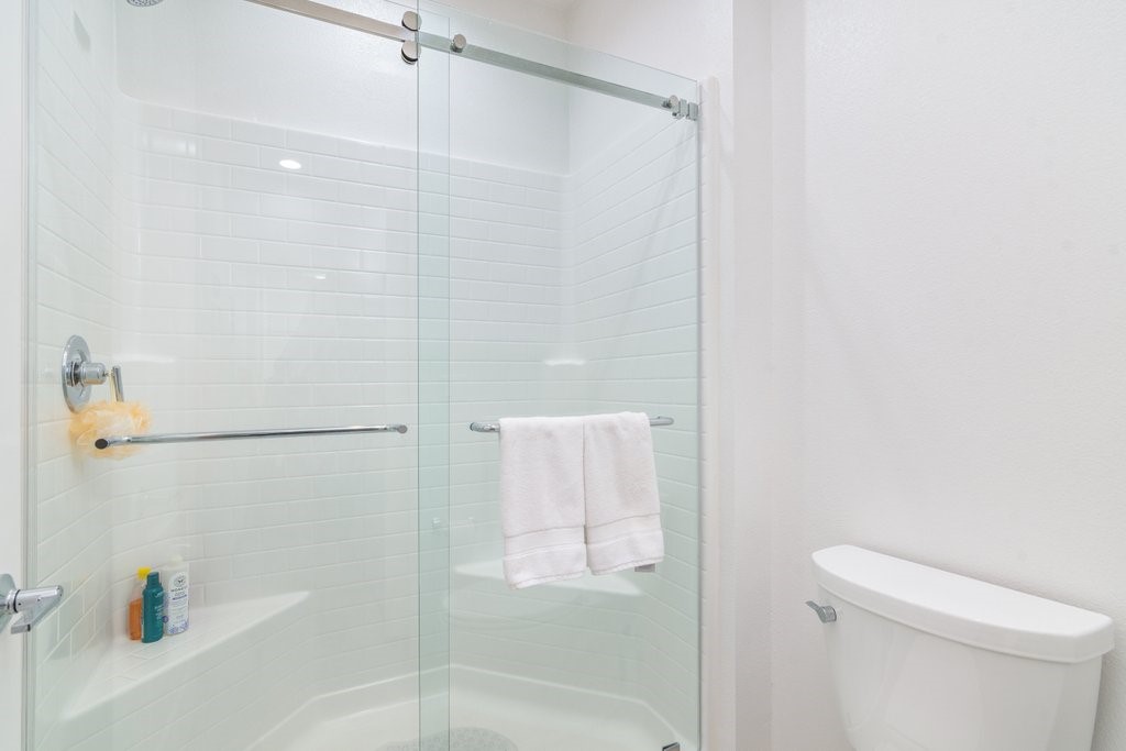 32250 Olea Way Temecula, CA 92591 - Photo 13 of 39 a bathroom with a shower and a toilet