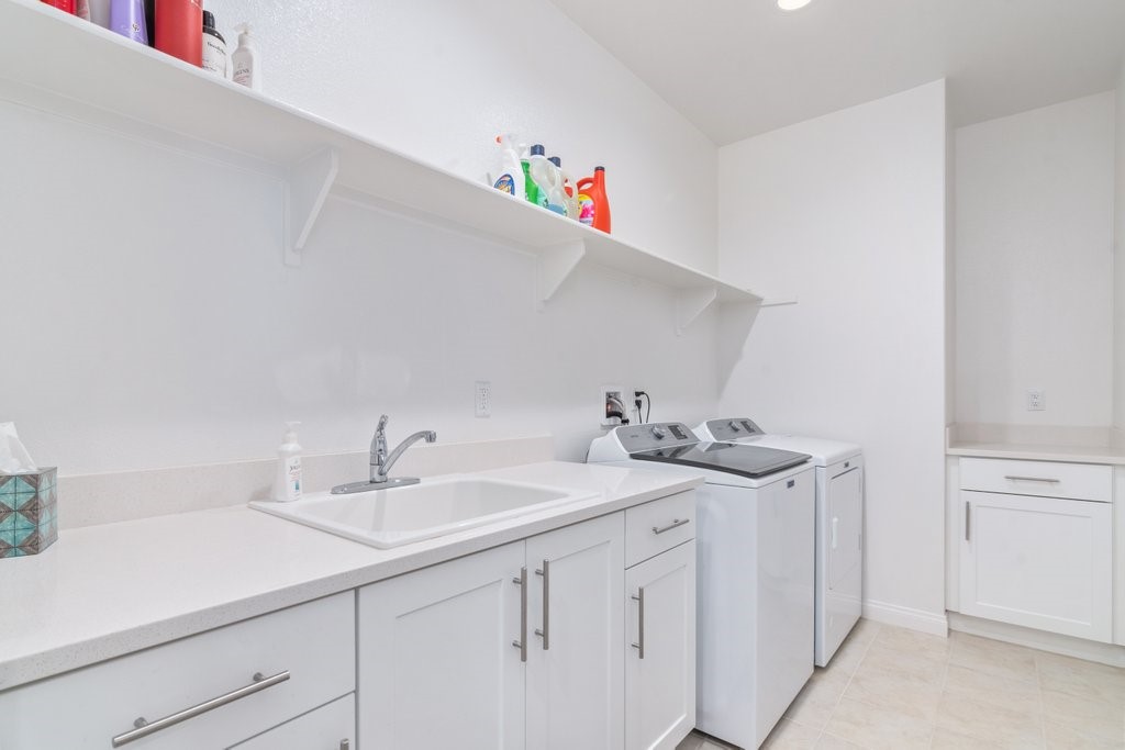 32250 Olea Way Temecula, CA 92591 - Photo 23 of 39 a bathroom with a sink and a mirror