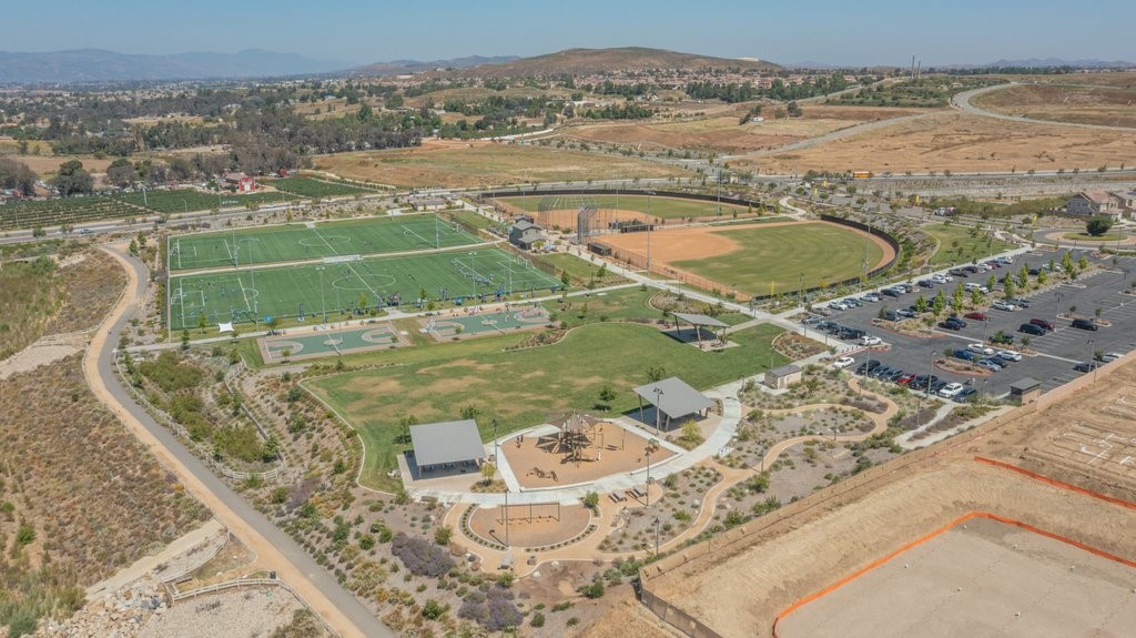 32250 Olea Way Temecula, CA 92591 - Photo 32 of 39 a view of a swimming pool with a mountain view