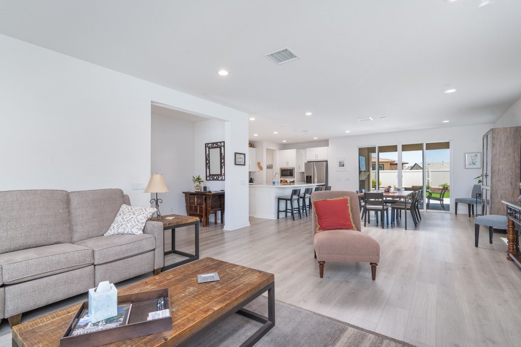32250 Olea Way Temecula, CA 92591 - Photo 5 of 39 a living room with furniture and wooden floor