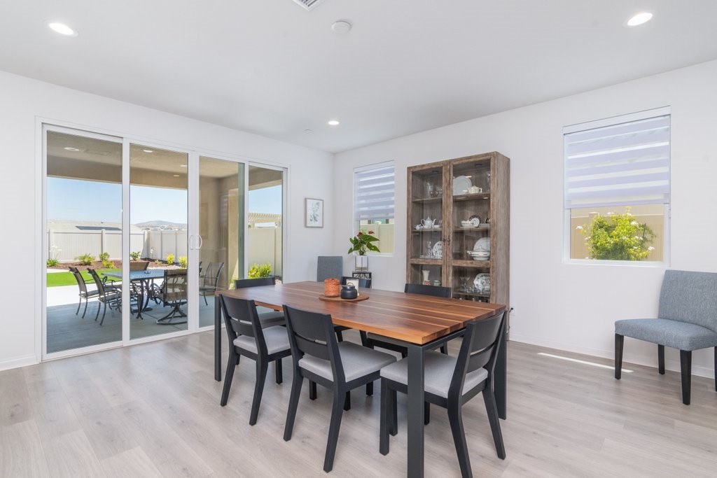 32250 Olea Way Temecula, CA 92591 - Photo 8 of 39 a view of a dining room with furniture and a window