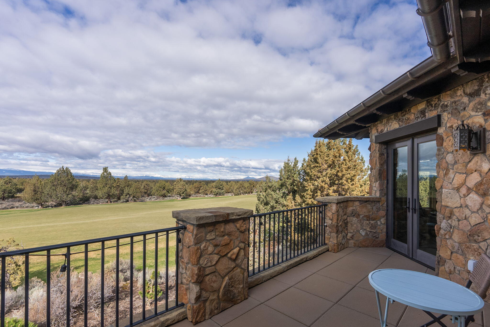 22887 Ghost Tree Lane Bend, OR 97701 - Photo 55 of 97 Primary bedroom's private balcony to enjoy the expansive Cascade Mountian Views and Fazio fairway.