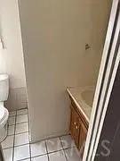a bathroom with a sink and toilet