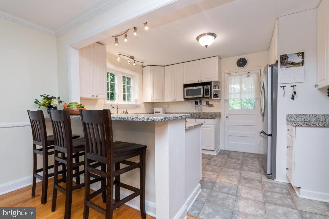 3917 Juniper Road Baltimore, MD 21218 - Photo 19 of 75 Breakfast bar with stools