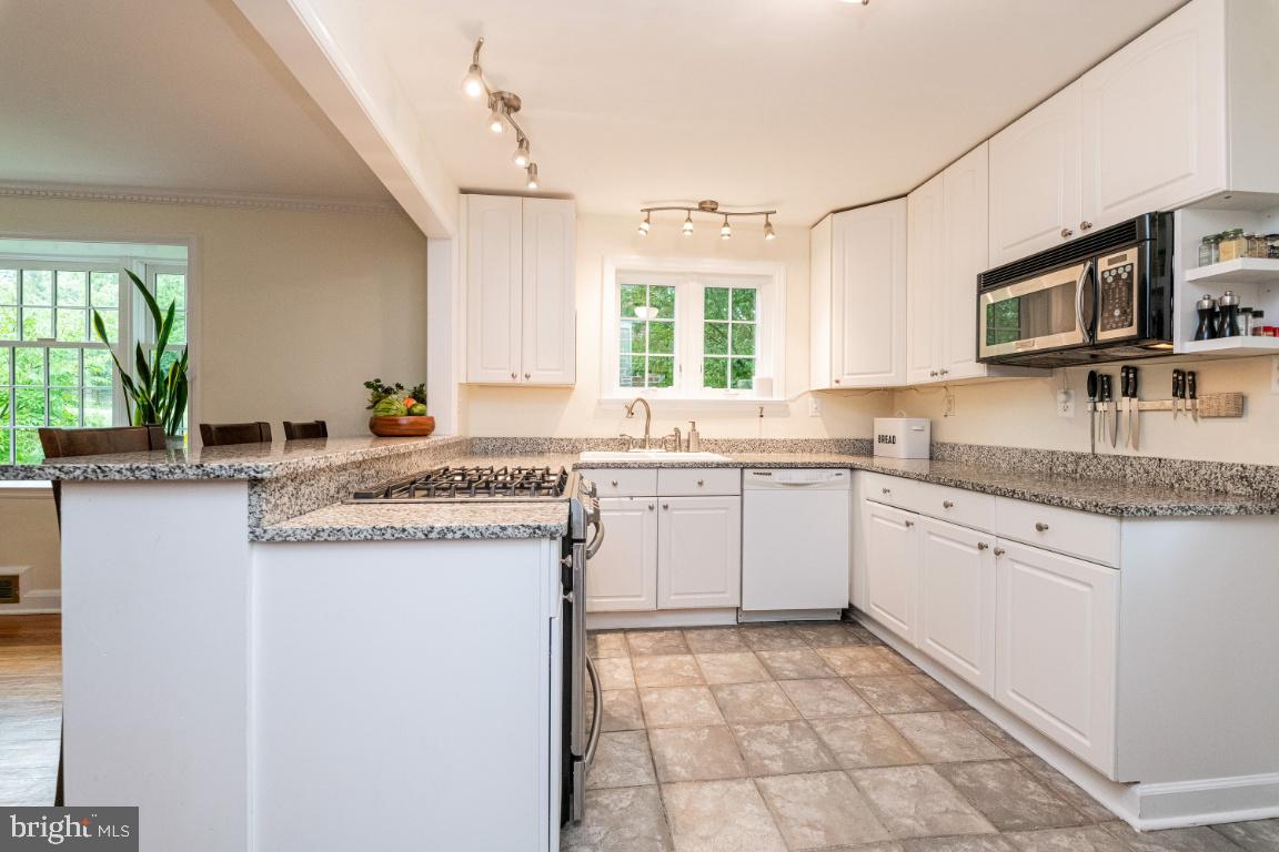 3917 Juniper Road Baltimore, MD 21218 - Photo 20 of 75 Newer kitchen with white cabinetry
