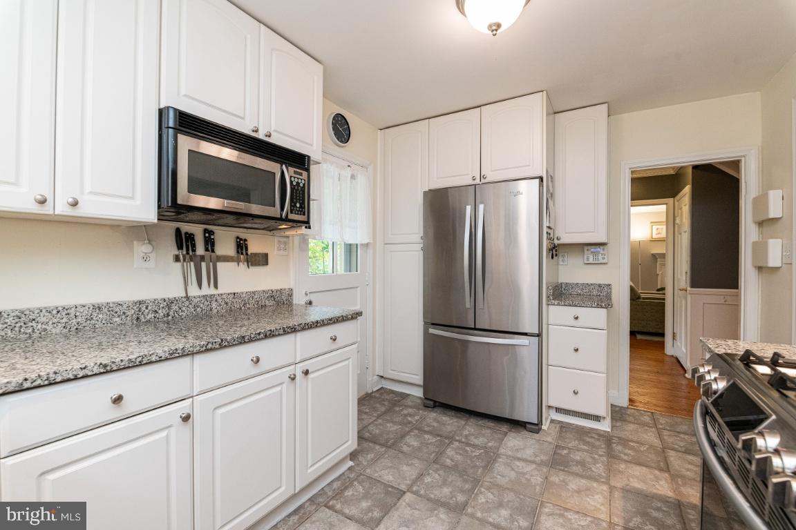 3917 Juniper Road Baltimore, MD 21218 - Photo 23 of 75 Tile floor and plenty of cabinet space