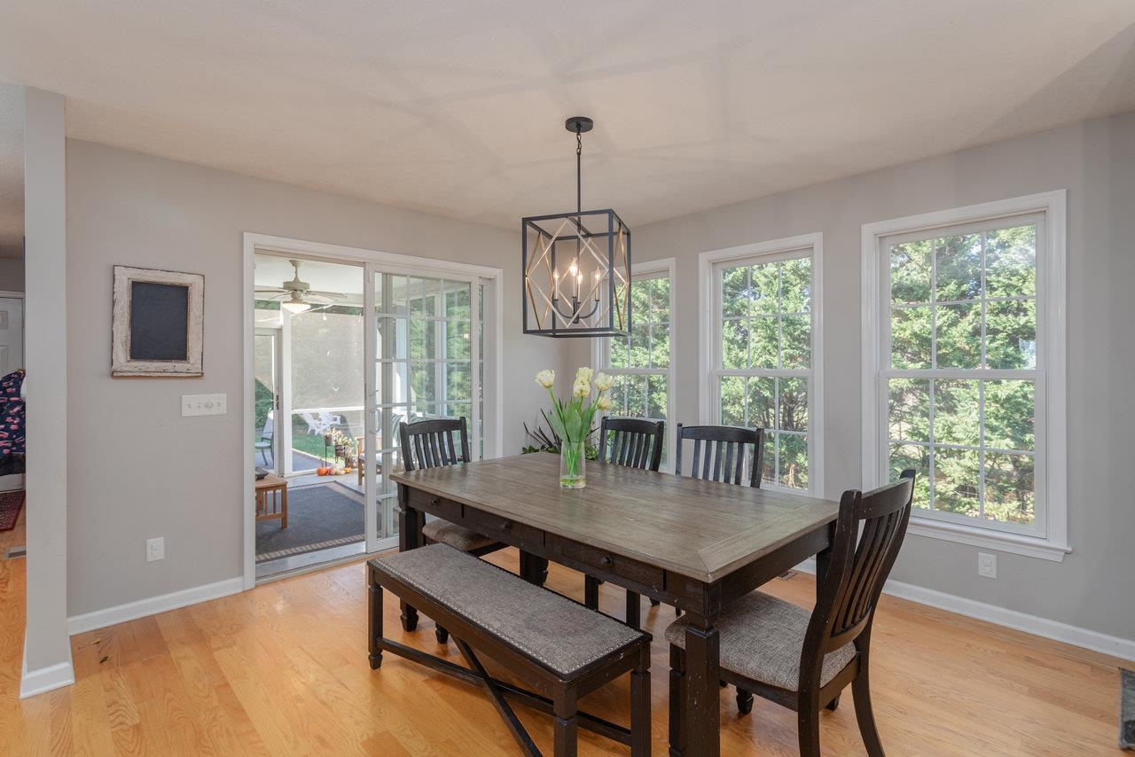 3750 Davis Road Penn Laird, VA 22846 - Photo 14 of 73 a dining room with furniture window wooden floor