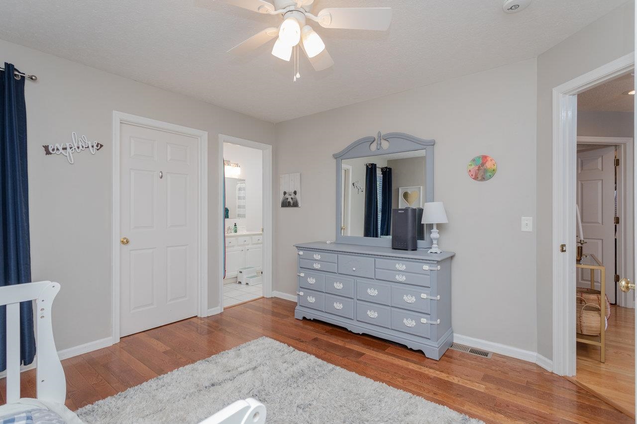 3750 Davis Road Penn Laird, VA 22846 - Photo 39 of 73 Second main level bedroom is spacious with beautiful, new hardwood flooring.