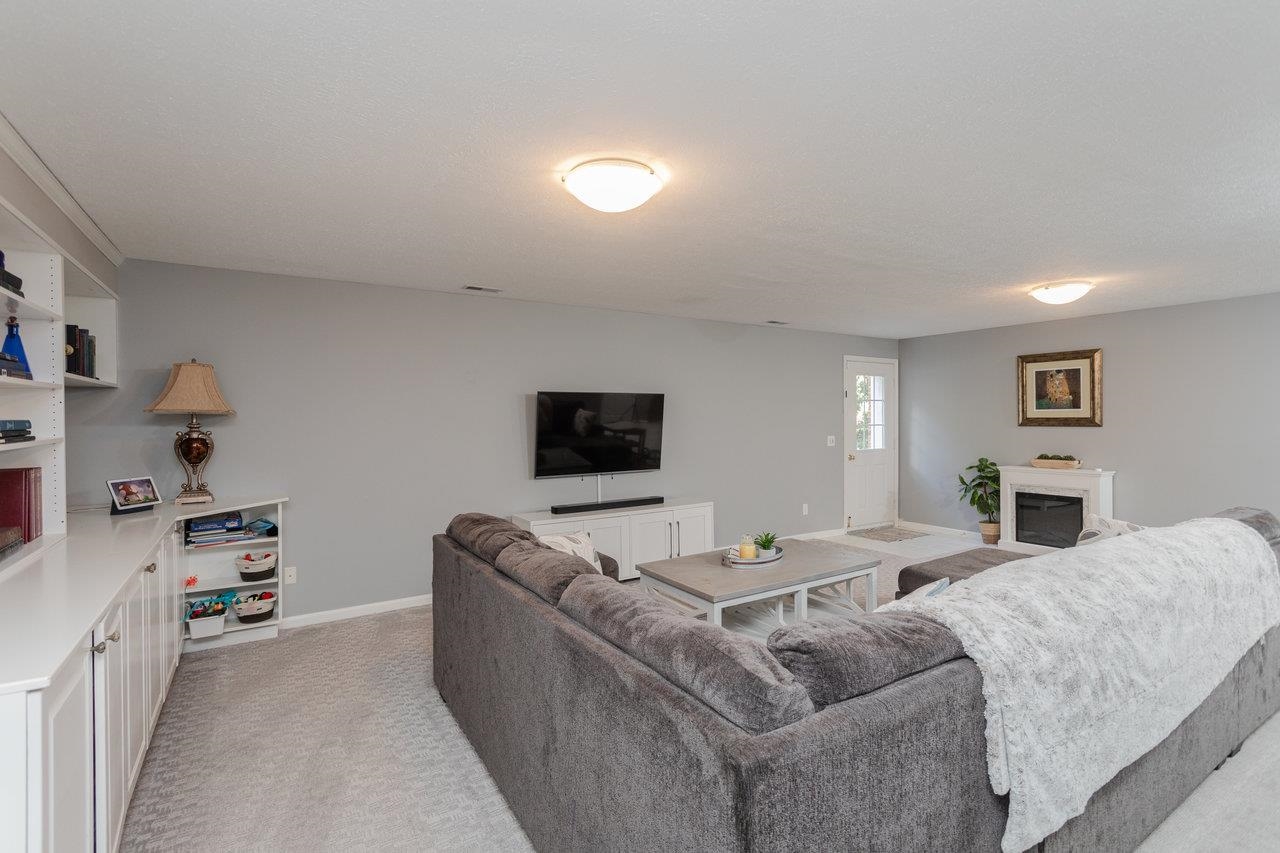 3750 Davis Road Penn Laird, VA 22846 - Photo 51 of 73 a living room with furniture and a flat screen tv