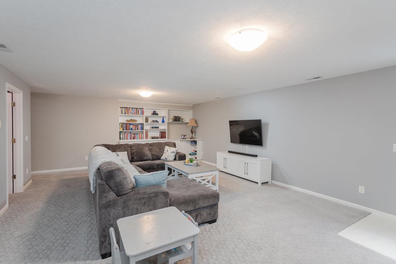 3750 Davis Road Penn Laird, VA 22846 - Photo 52 of 73 a living room with furniture and a flat screen tv