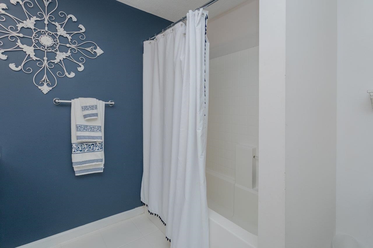 3750 Davis Road Penn Laird, VA 22846 - Photo 59 of 73 a view of a hallway with paintings on the wall