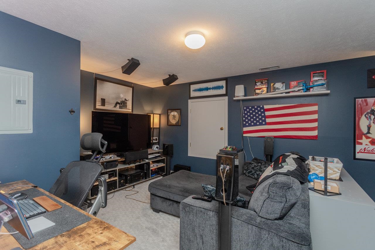 3750 Davis Road Penn Laird, VA 22846 - Photo 62 of 73 a room with furniture and a flat screen tv