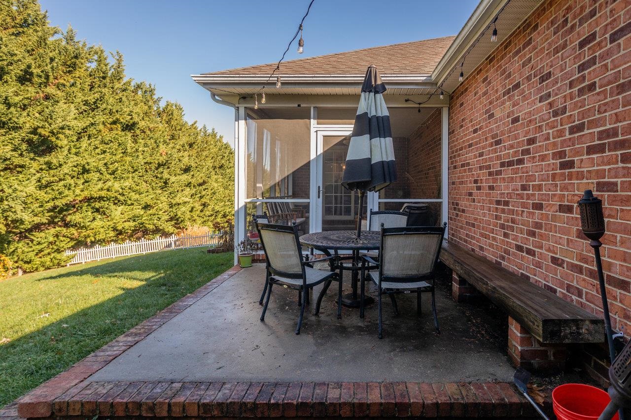 3750 Davis Road Penn Laird, VA 22846 - Photo 65 of 73 a view of a patio with table and chairs and potted plants