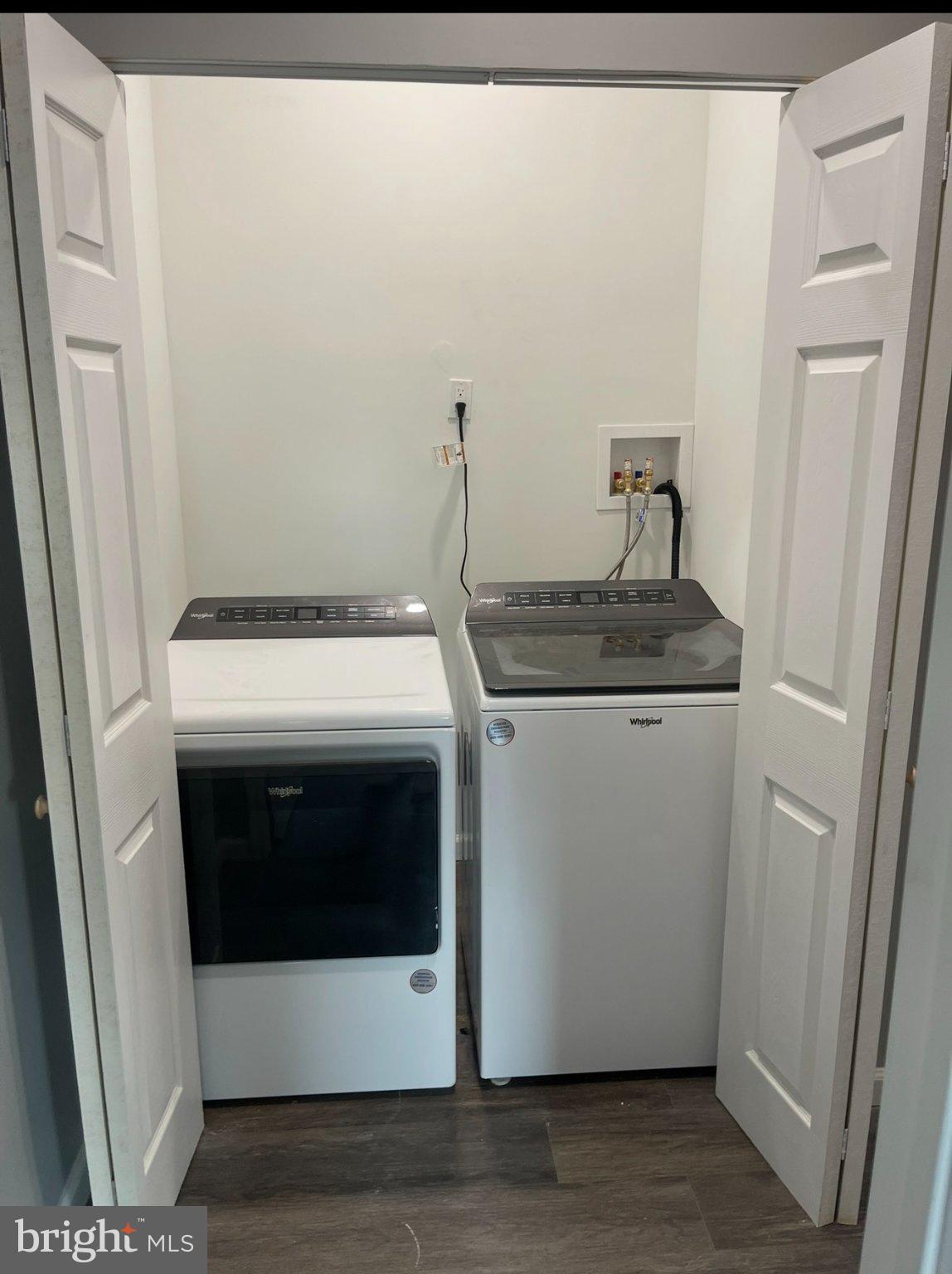 2045 North 8th Street, Unit 3 Philadelphia, PA 19122 - Photo 8 of 9 a utility room with dryer and washer