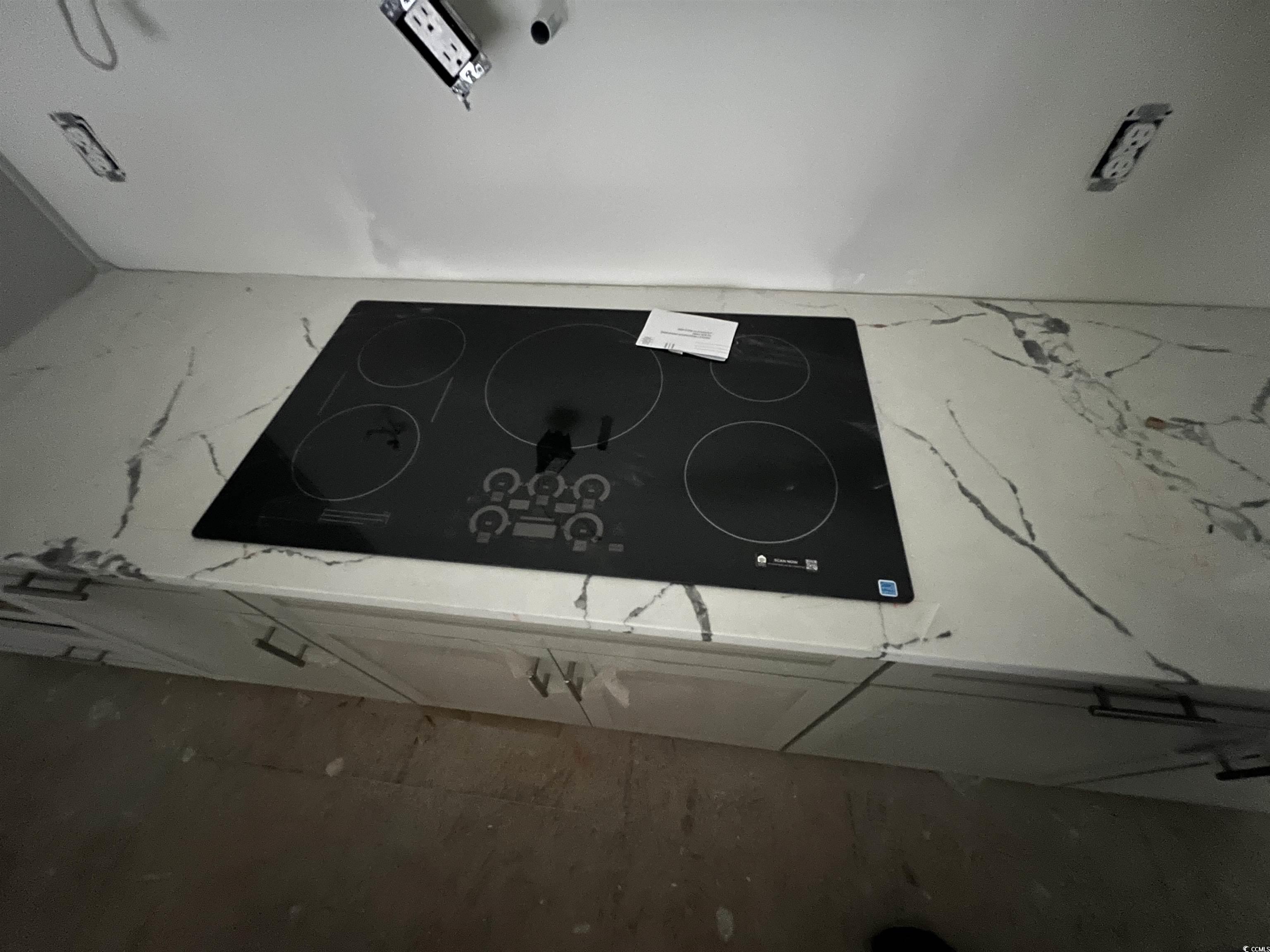 1000 Inlet View Drive North Myrtle Beach, SC 29582 - Photo 32 of 40 Kitchen view of black electric stovetop