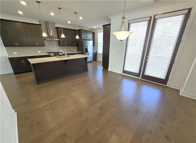 a view of a balcony with wooden floor