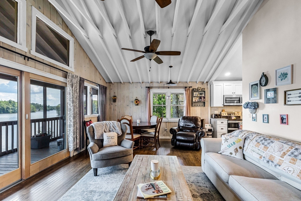 53 Sandy Beach Road Holland, MA 01521 - Photo 20 of 40 a living room with furniture ceiling fan and a rug