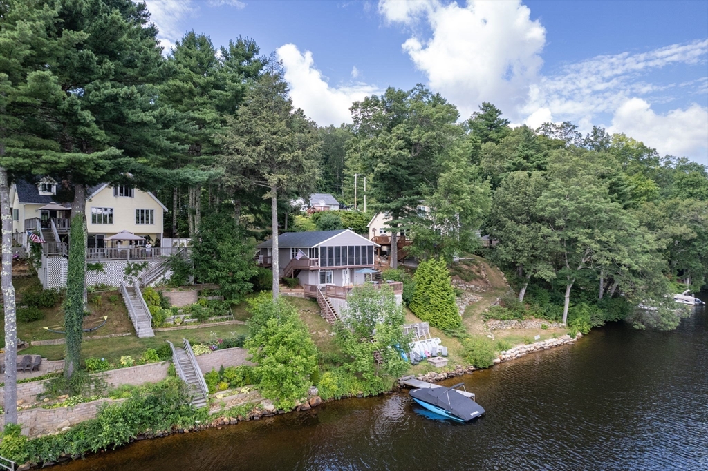53 Sandy Beach Road Holland, MA 01521 - Photo 7 of 40 an aerial view of a house with yard swimming pool and outdoor seating