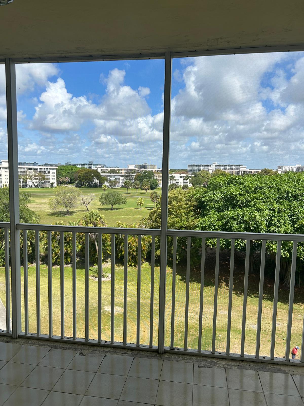 2661 South Course Drive, Unit 703 Pompano Beach, FL 33069 - Photo 8 of 11 a view of a city from a balcony