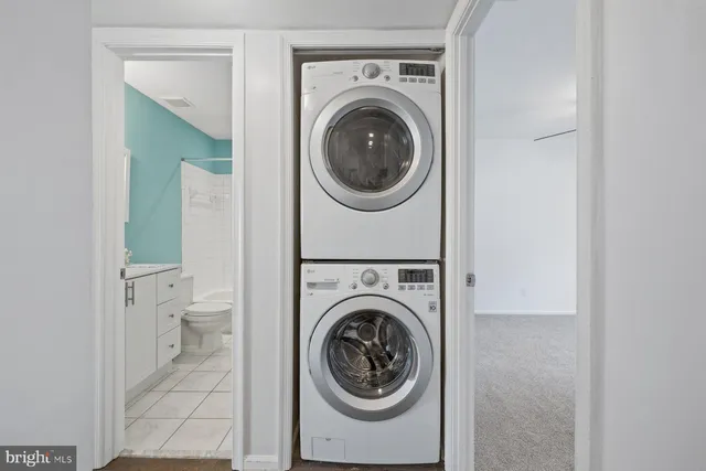 a utility room with dryer and washer