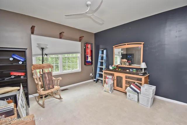 a room with furniture and a window