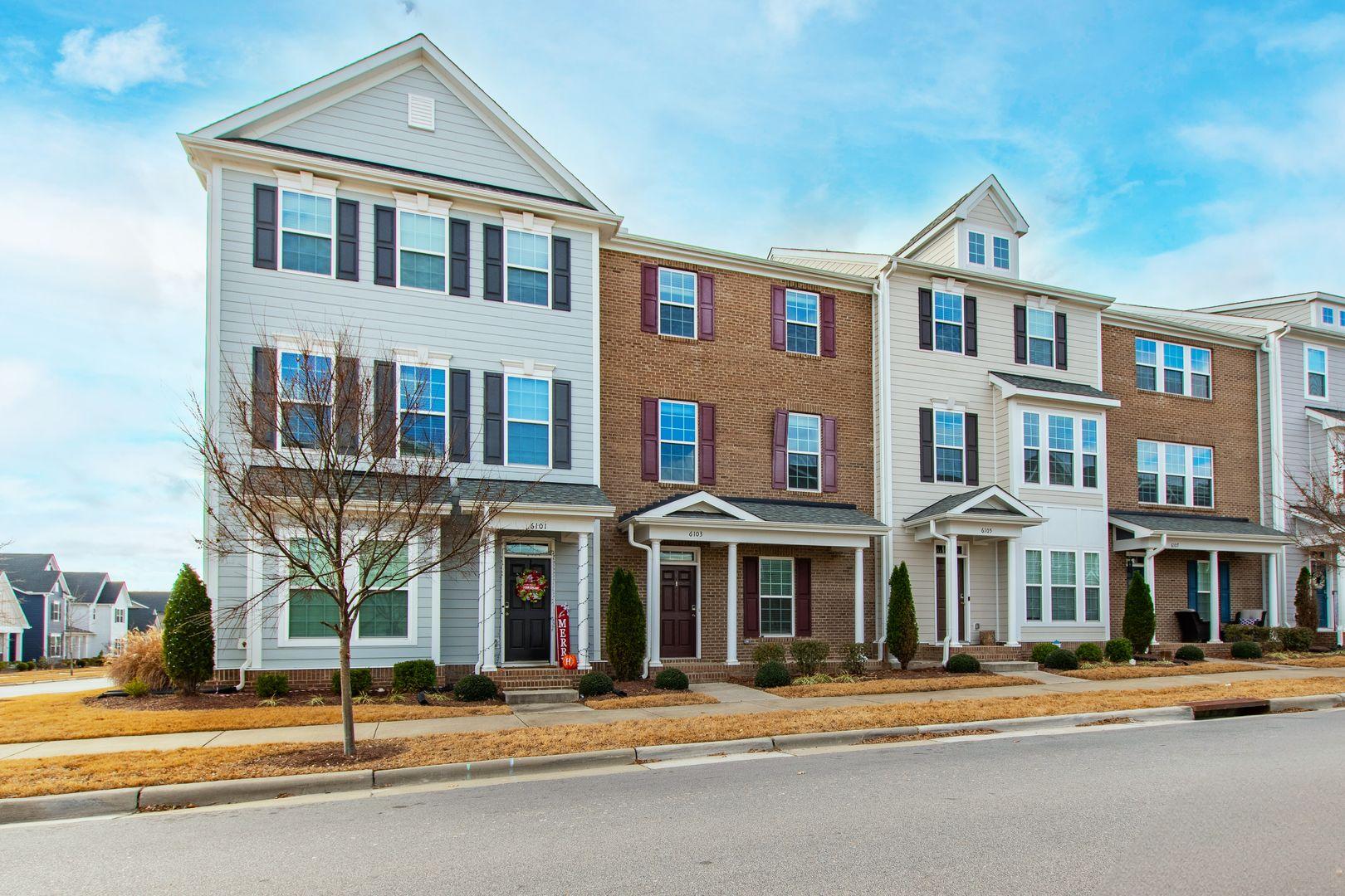 6103 Kayton Street Raleigh, NC 27616 - Photo 44 of 45 a front view of a brick building