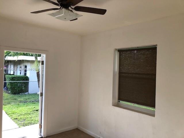 471 Southwest 10th Street, Unit 5 Miami, FL 33130 - Photo 2 of 10 a view of a hallway with a window