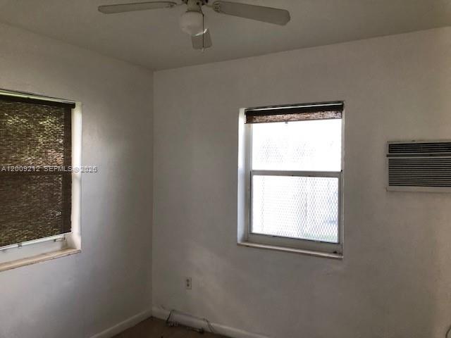 471 Southwest 10th Street, Unit 5 Miami, FL 33130 - Photo 3 of 10 a small space with a window